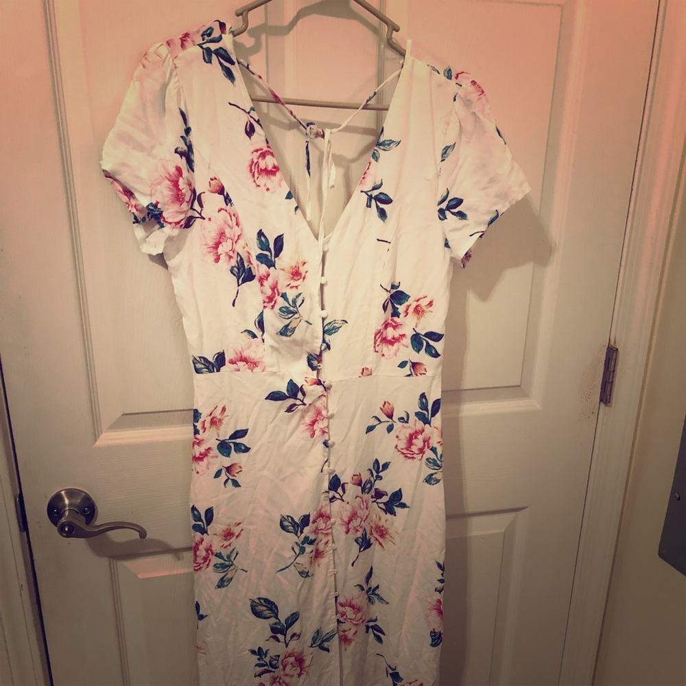 A beautiful high low flower detailed dress